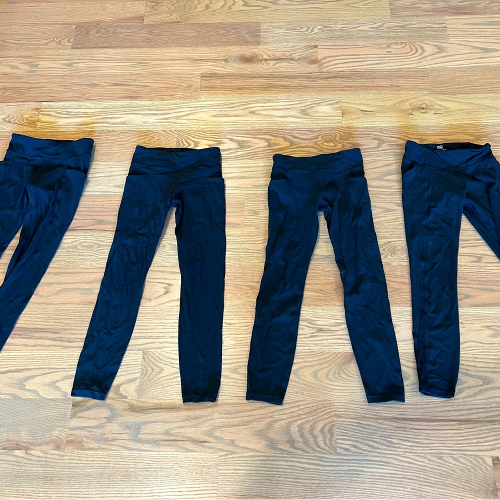 4 pairs of Athleta Girl High Rise Stash Your Treasures Tight